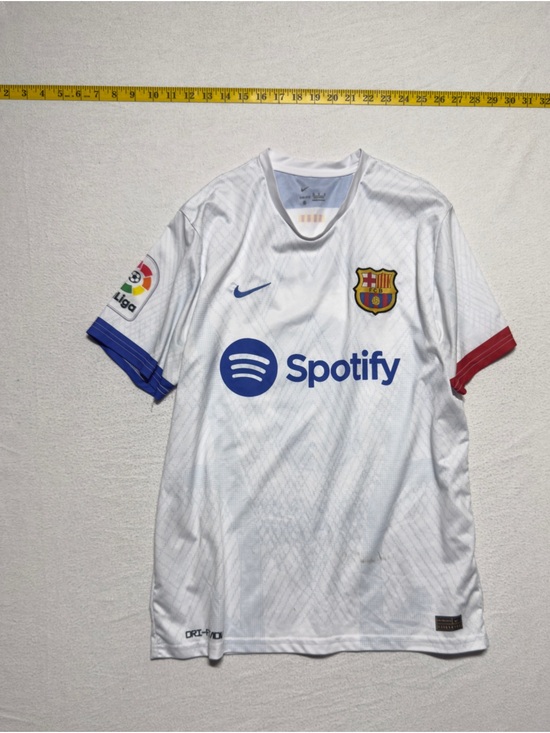 Nike Other - Nike White FC Barcelona Spotify Away Jersey with Blue and Red Accents